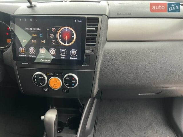 Красный Ниссан Тиида, объемом двигателя 1.6 л и пробегом 100 тыс. км за 6500 $, фото 20 на Automoto.ua