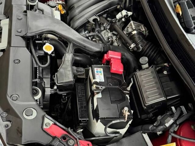 Красный Ниссан Тиида, объемом двигателя 1.6 л и пробегом 160 тыс. км за 6600 $, фото 11 на Automoto.ua