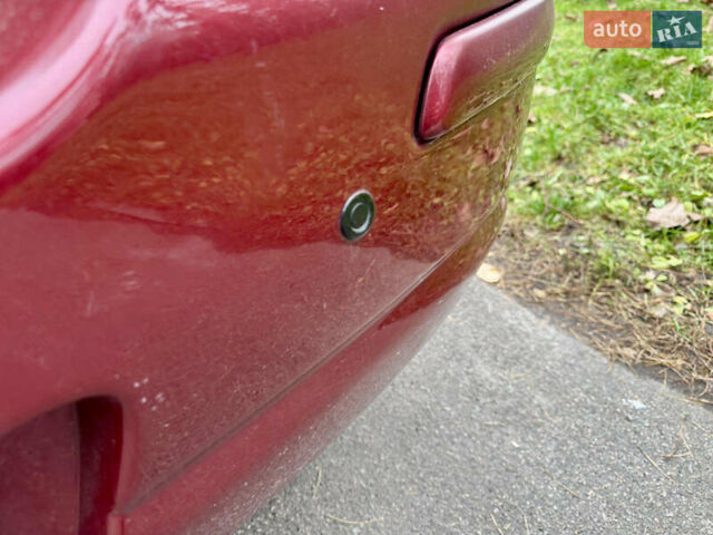 Красный Ниссан Тиида, объемом двигателя 1.6 л и пробегом 100 тыс. км за 6500 $, фото 14 на Automoto.ua