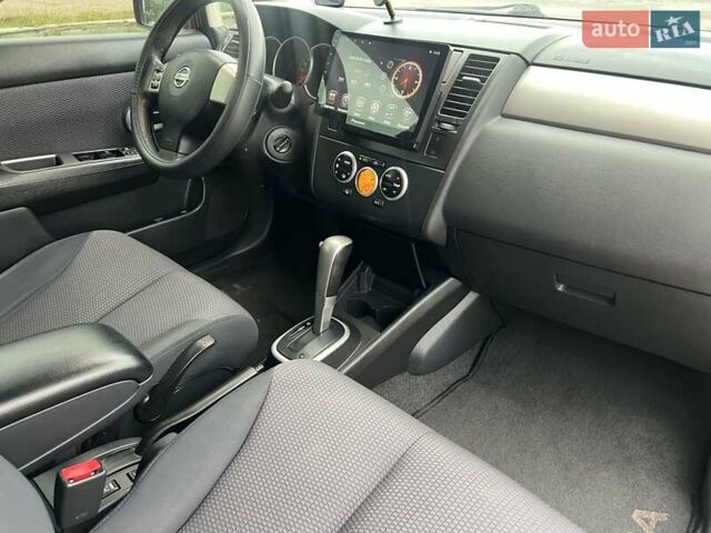 Красный Ниссан Тиида, объемом двигателя 1.6 л и пробегом 100 тыс. км за 6500 $, фото 14 на Automoto.ua