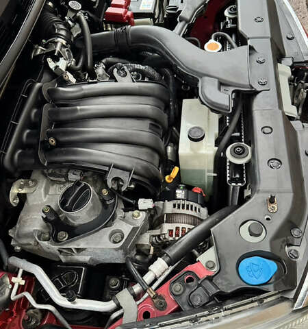 Красный Ниссан Тиида, объемом двигателя 1.6 л и пробегом 160 тыс. км за 6550 $, фото 12 на Automoto.ua