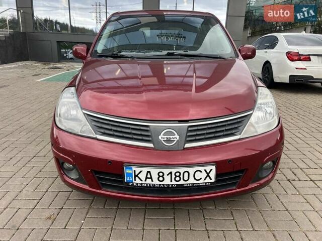 Красный Ниссан Тиида, объемом двигателя 1.6 л и пробегом 100 тыс. км за 6500 $, фото 1 на Automoto.ua