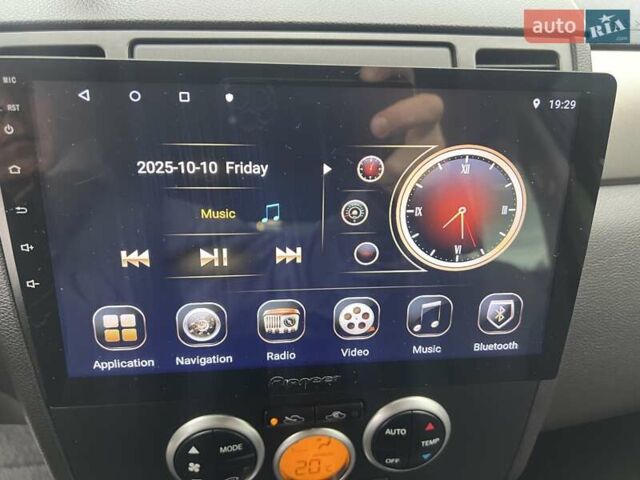 Красный Ниссан Тиида, объемом двигателя 1.6 л и пробегом 100 тыс. км за 6500 $, фото 11 на Automoto.ua