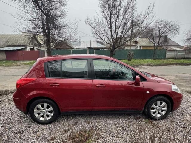 Красный Ниссан Тиида, объемом двигателя 1.6 л и пробегом 145 тыс. км за 5387 $, фото 13 на Automoto.ua