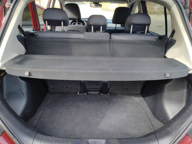 Красный Ниссан Тиида, объемом двигателя 1.6 л и пробегом 170 тыс. км за 5600 $, фото 12 на Automoto.ua