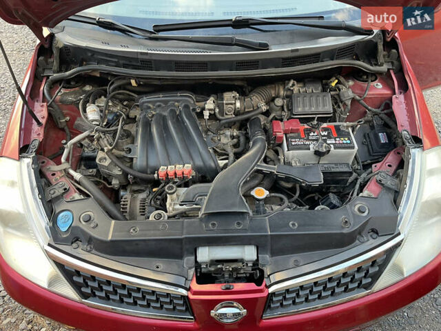 Червоний Ніссан Тііда, об'ємом двигуна 1.6 л та пробігом 147 тис. км за 5000 $, фото 16 на Automoto.ua