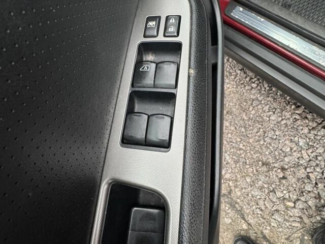 Красный Ниссан Тиида, объемом двигателя 1.6 л и пробегом 145 тыс. км за 5387 $, фото 17 на Automoto.ua