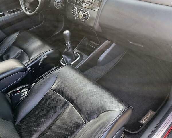 Красный Ниссан Тиида, объемом двигателя 1.8 л и пробегом 175 тыс. км за 5600 $, фото 10 на Automoto.ua