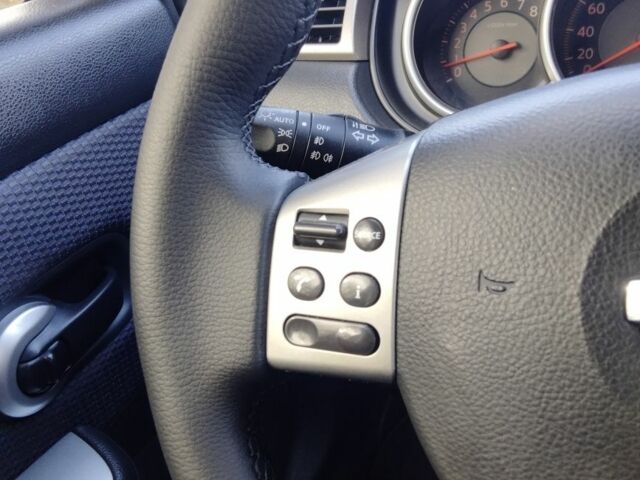 Красный Ниссан Тиида, объемом двигателя 1.6 л и пробегом 170 тыс. км за 5600 $, фото 3 на Automoto.ua