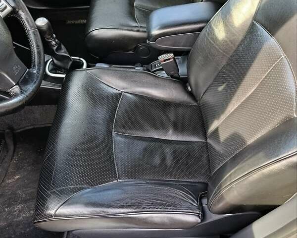 Красный Ниссан Тиида, объемом двигателя 1.8 л и пробегом 175 тыс. км за 5600 $, фото 9 на Automoto.ua