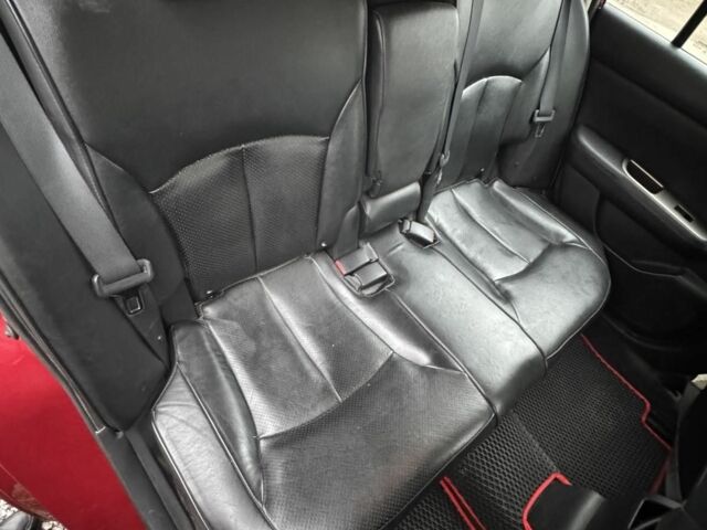 Красный Ниссан Тиида, объемом двигателя 1.6 л и пробегом 145 тыс. км за 5387 $, фото 16 на Automoto.ua