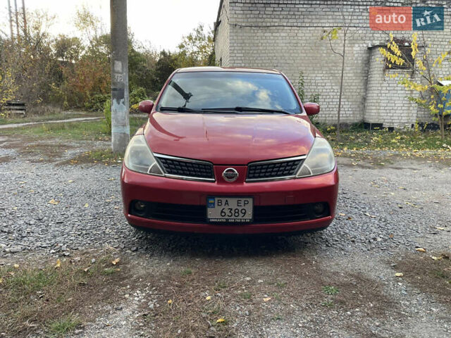 Червоний Ніссан Тііда, об'ємом двигуна 1.6 л та пробігом 147 тис. км за 5000 $, фото 1 на Automoto.ua