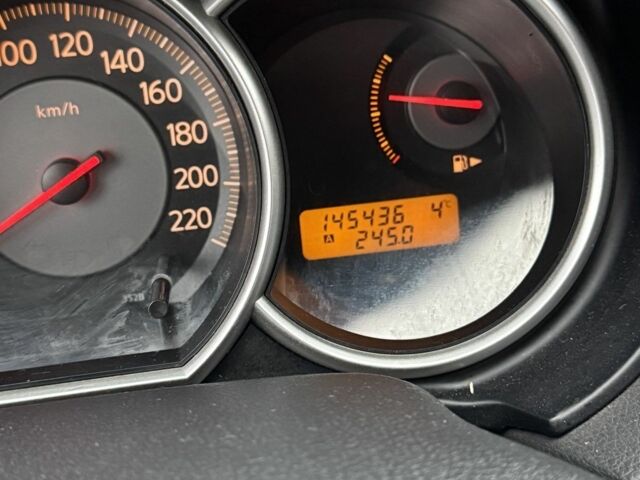 Красный Ниссан Тиида, объемом двигателя 1.6 л и пробегом 145 тыс. км за 5387 $, фото 5 на Automoto.ua