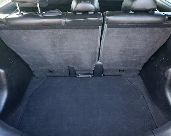 Красный Ниссан Тиида, объемом двигателя 1.8 л и пробегом 175 тыс. км за 5600 $, фото 12 на Automoto.ua