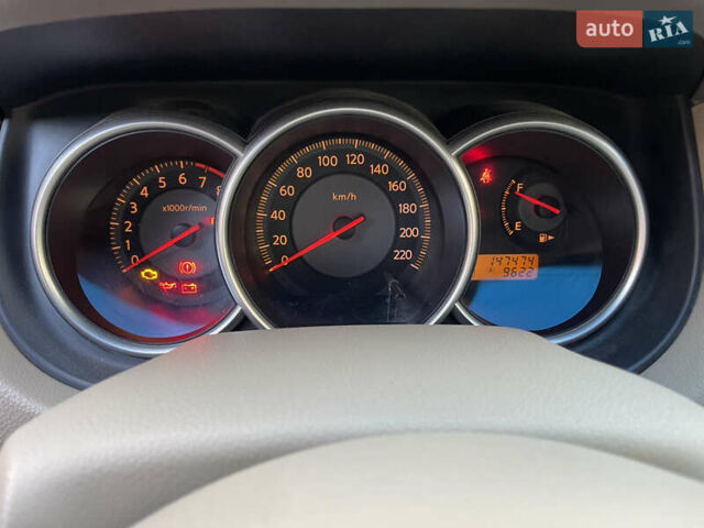 Червоний Ніссан Тііда, об'ємом двигуна 1.6 л та пробігом 147 тис. км за 5000 $, фото 17 на Automoto.ua
