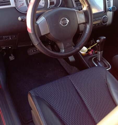 Красный Ниссан Тиида, объемом двигателя 1.5 л и пробегом 59 тыс. км за 7500 $, фото 10 на Automoto.ua