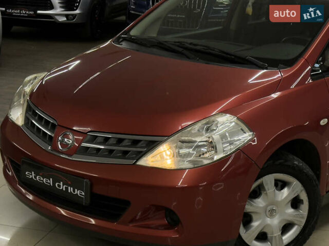 Красный Ниссан Тиида, объемом двигателя 1.5 л и пробегом 68 тыс. км за 7599 $, фото 1 на Automoto.ua