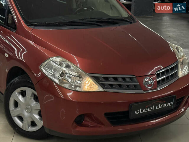Красный Ниссан Тиида, объемом двигателя 1.5 л и пробегом 68 тыс. км за 7599 $, фото 5 на Automoto.ua