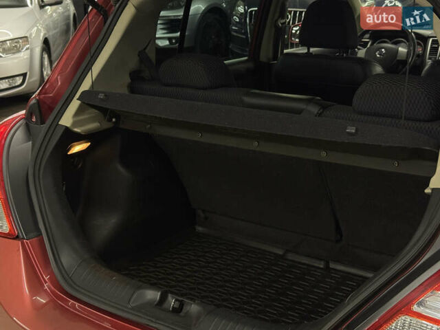 Красный Ниссан Тиида, объемом двигателя 1.5 л и пробегом 68 тыс. км за 7599 $, фото 23 на Automoto.ua