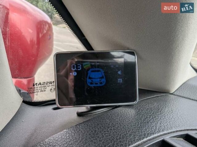 Червоний Ніссан Тііда, об'ємом двигуна 1.6 л та пробігом 142 тис. км за 7800 $, фото 16 на Automoto.ua