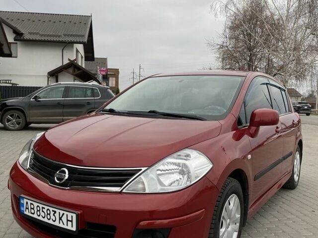 Красный Ниссан Тиида, объемом двигателя 1.6 л и пробегом 59 тыс. км за 9900 $, фото 1 на Automoto.ua