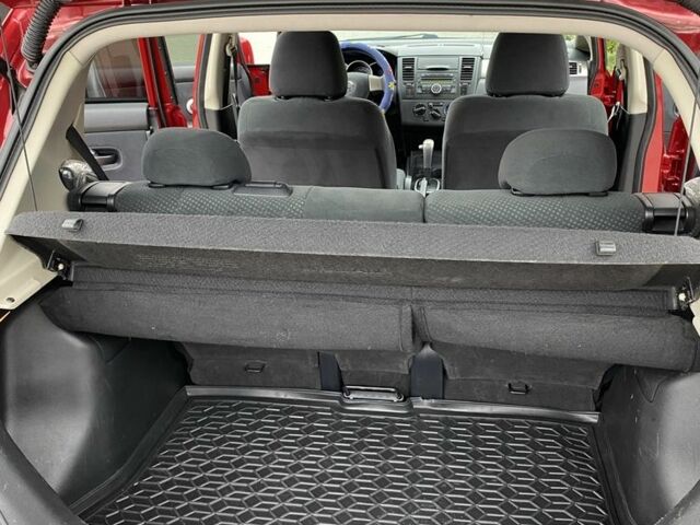 Красный Ниссан Тиида, объемом двигателя 1.6 л и пробегом 59 тыс. км за 9900 $, фото 6 на Automoto.ua