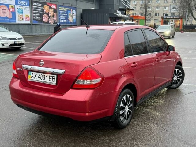 Красный Ниссан Тиида, объемом двигателя 1.6 л и пробегом 118 тыс. км за 5850 $, фото 3 на Automoto.ua