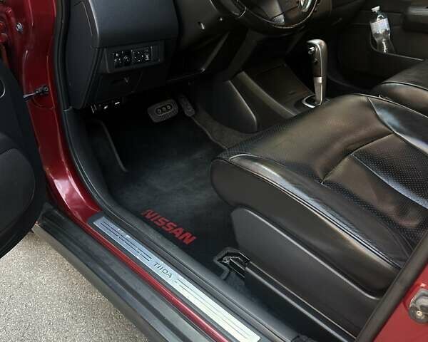Красный Ниссан Тиида, объемом двигателя 1.6 л и пробегом 193 тыс. км за 7550 $, фото 16 на Automoto.ua