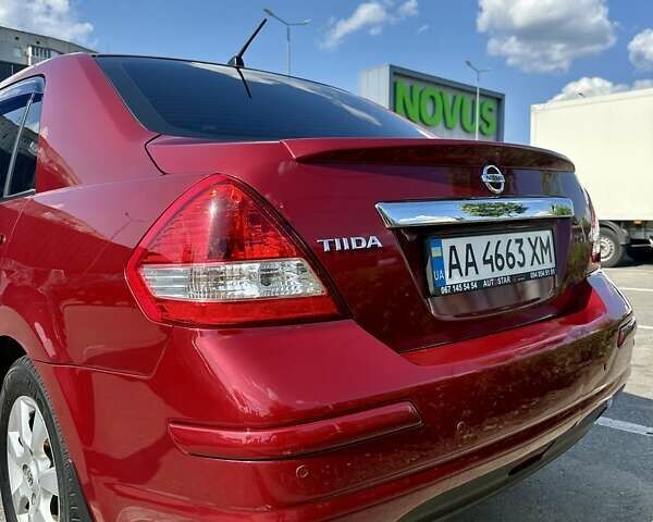 Красный Ниссан Тиида, объемом двигателя 1.6 л и пробегом 193 тыс. км за 7550 $, фото 6 на Automoto.ua