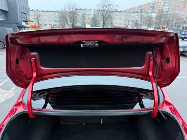 Красный Ниссан Тиида, объемом двигателя 1.6 л и пробегом 118 тыс. км за 5850 $, фото 13 на Automoto.ua