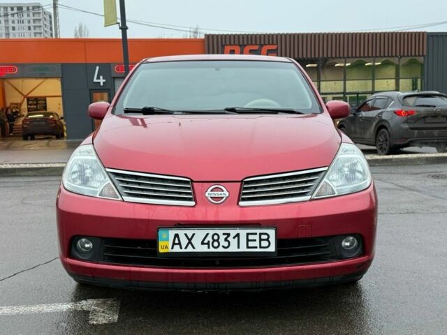 Красный Ниссан Тиида, объемом двигателя 1.6 л и пробегом 118 тыс. км за 5850 $, фото 1 на Automoto.ua