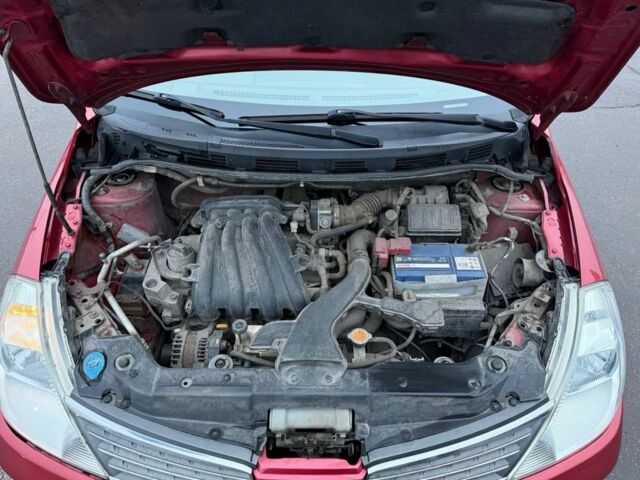 Красный Ниссан Тиида, объемом двигателя 1.6 л и пробегом 118 тыс. км за 5850 $, фото 20 на Automoto.ua