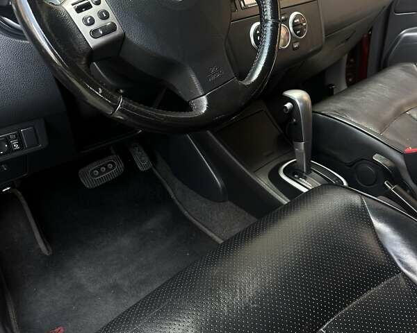 Красный Ниссан Тиида, объемом двигателя 1.6 л и пробегом 193 тыс. км за 7550 $, фото 10 на Automoto.ua