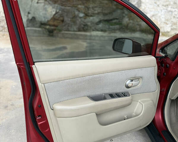 Красный Ниссан Тиида, объемом двигателя 1.6 л и пробегом 227 тыс. км за 5900 $, фото 18 на Automoto.ua