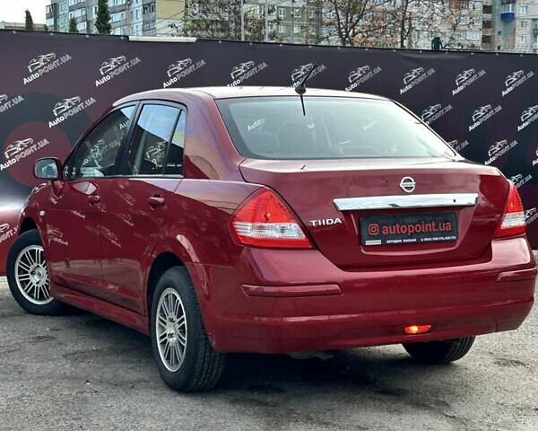 Красный Ниссан Тиида, объемом двигателя 1.6 л и пробегом 155 тыс. км за 6800 $, фото 7 на Automoto.ua