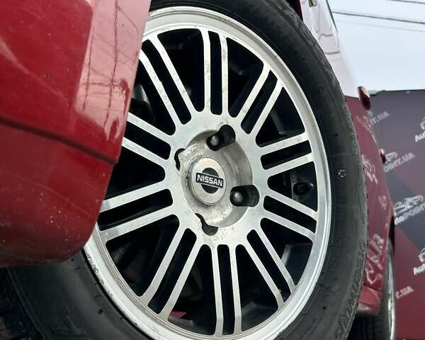 Красный Ниссан Тиида, объемом двигателя 1.6 л и пробегом 155 тыс. км за 6800 $, фото 5 на Automoto.ua