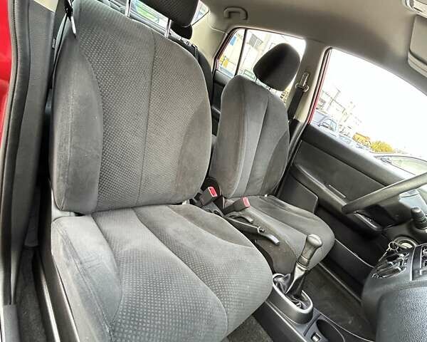 Красный Ниссан Тиида, объемом двигателя 1.6 л и пробегом 155 тыс. км за 6800 $, фото 27 на Automoto.ua