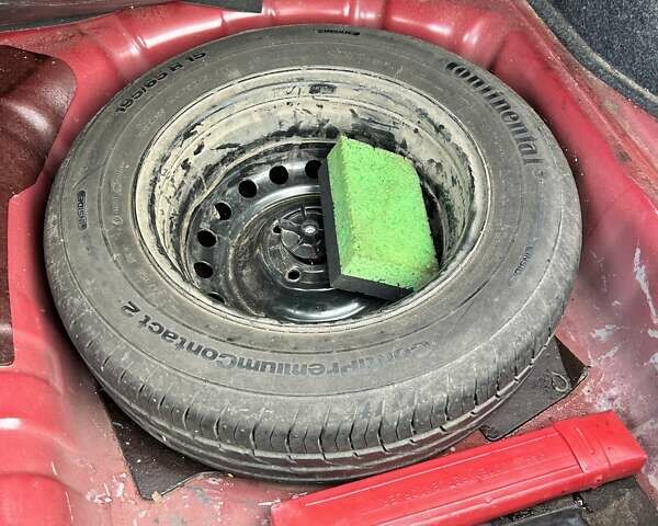 Красный Ниссан Тиида, объемом двигателя 1.6 л и пробегом 155 тыс. км за 6800 $, фото 11 на Automoto.ua