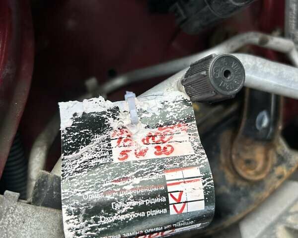 Красный Ниссан Тиида, объемом двигателя 1.6 л и пробегом 155 тыс. км за 6800 $, фото 29 на Automoto.ua