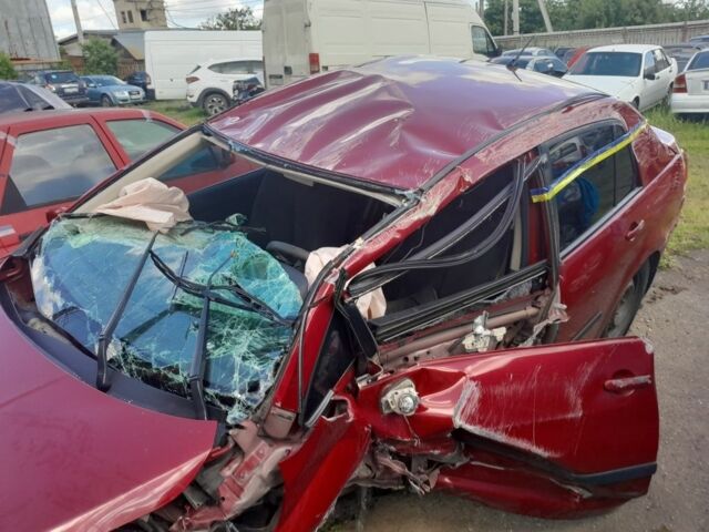 Красный Ниссан Тиида, объемом двигателя 1.6 л и пробегом 94 тыс. км за 3500 $, фото 12 на Automoto.ua