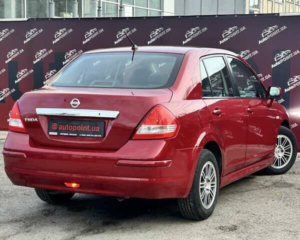 Красный Ниссан Тиида, объемом двигателя 1.6 л и пробегом 155 тыс. км за 6800 $, фото 6 на Automoto.ua
