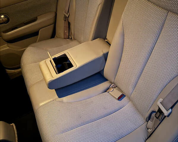 Желтый Ниссан Тиида, объемом двигателя 1.6 л и пробегом 171 тыс. км за 5799 $, фото 9 на Automoto.ua