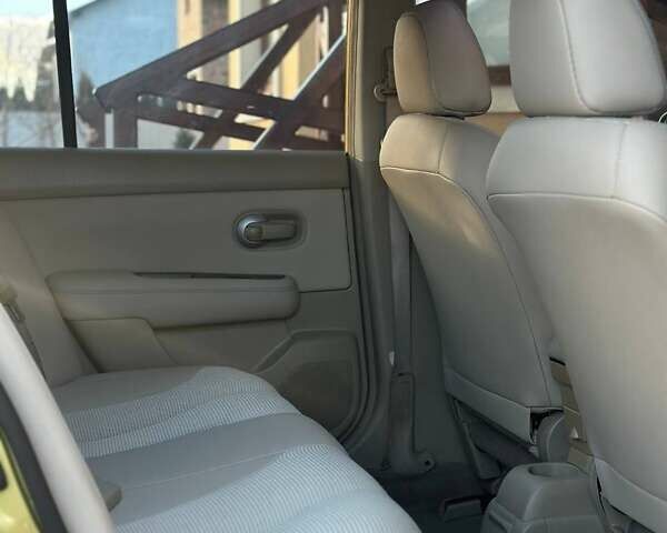 Жовтий Ніссан Тііда, об'ємом двигуна 1.6 л та пробігом 164 тис. км за 5999 $, фото 25 на Automoto.ua