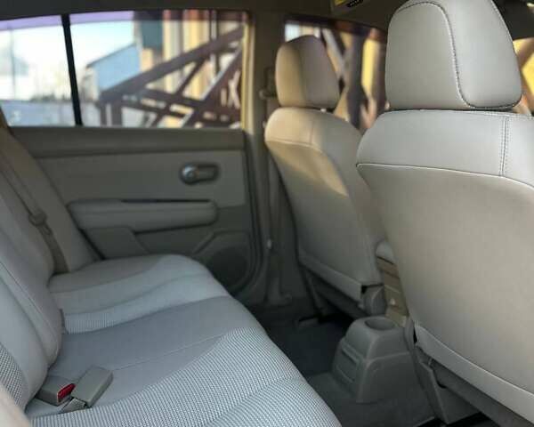 Жовтий Ніссан Тііда, об'ємом двигуна 1.6 л та пробігом 164 тис. км за 5999 $, фото 26 на Automoto.ua