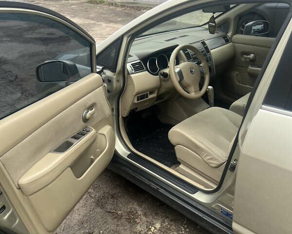 Желтый Ниссан Тиида, объемом двигателя 1.6 л и пробегом 204 тыс. км за 4300 $, фото 4 на Automoto.ua