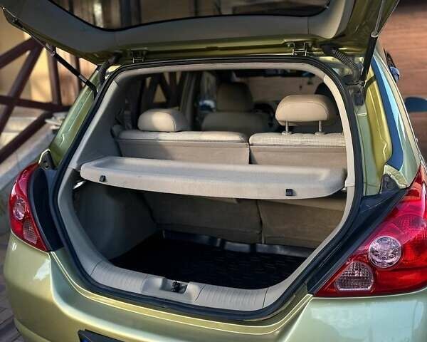Жовтий Ніссан Тііда, об'ємом двигуна 1.6 л та пробігом 164 тис. км за 5999 $, фото 47 на Automoto.ua