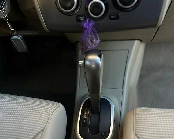 Жовтий Ніссан Тііда, об'ємом двигуна 1.6 л та пробігом 164 тис. км за 5999 $, фото 29 на Automoto.ua