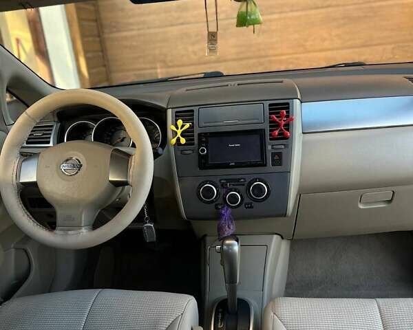 Жовтий Ніссан Тііда, об'ємом двигуна 1.6 л та пробігом 164 тис. км за 5999 $, фото 28 на Automoto.ua