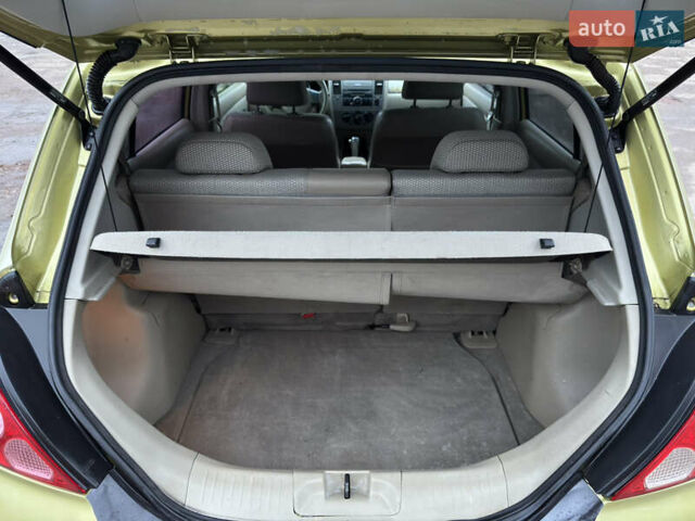 Желтый Ниссан Тиида, объемом двигателя 1.6 л и пробегом 171 тыс. км за 5799 $, фото 19 на Automoto.ua