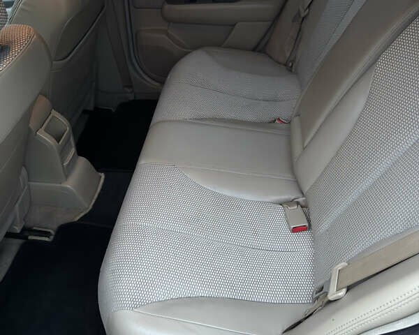 Желтый Ниссан Тиида, объемом двигателя 1.6 л и пробегом 171 тыс. км за 5799 $, фото 8 на Automoto.ua